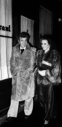 Jean Paul Belmondo and his girlfriend Laura Antonelli going at the Alcazar for New Year's Eve (anonymous) - Muzeo.com