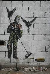 Graffiti d'homme balayant des balles (anonymous) - Muzeo.com